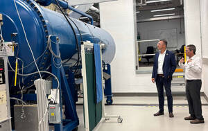 Professor Dan Bardayan is describing the purpose of the 9S accelerator in the nuclear science lab.
